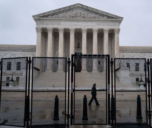 Irony: Fences Back at the Capital, Still None at the Border