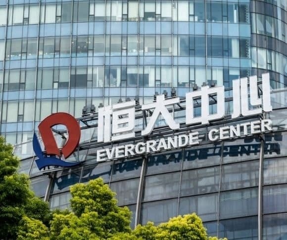 China Reassures World as Evergrande Teeters on Default