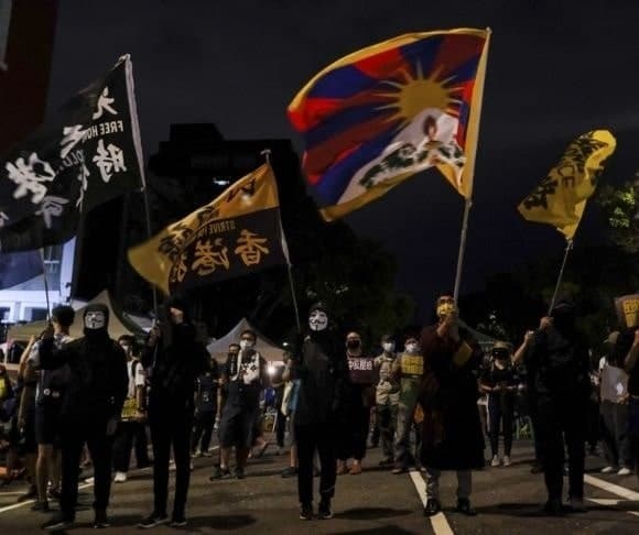 China Senses Opportunity and Threatens Taiwan