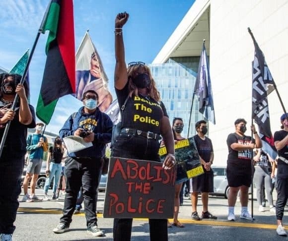 Biden, Democrats Use Jan 6 to Bury Their Defund the Police Past