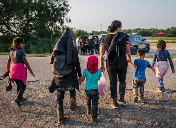 COVID Outbreak Covered Up at Migrant Center