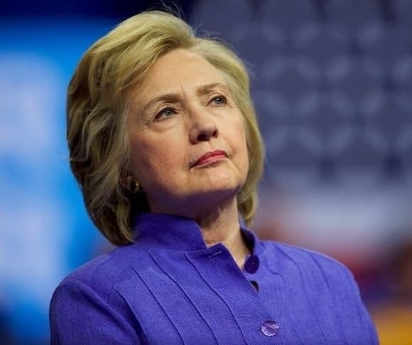 Is Hillary’s Dire Warning a Cause for Christmas Cheer?