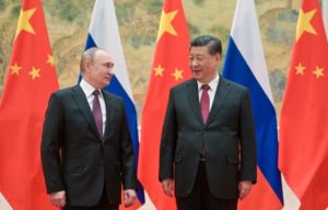 GettyImages-1238174155 Vladimir Putin (L) and Xi Jinping (R)