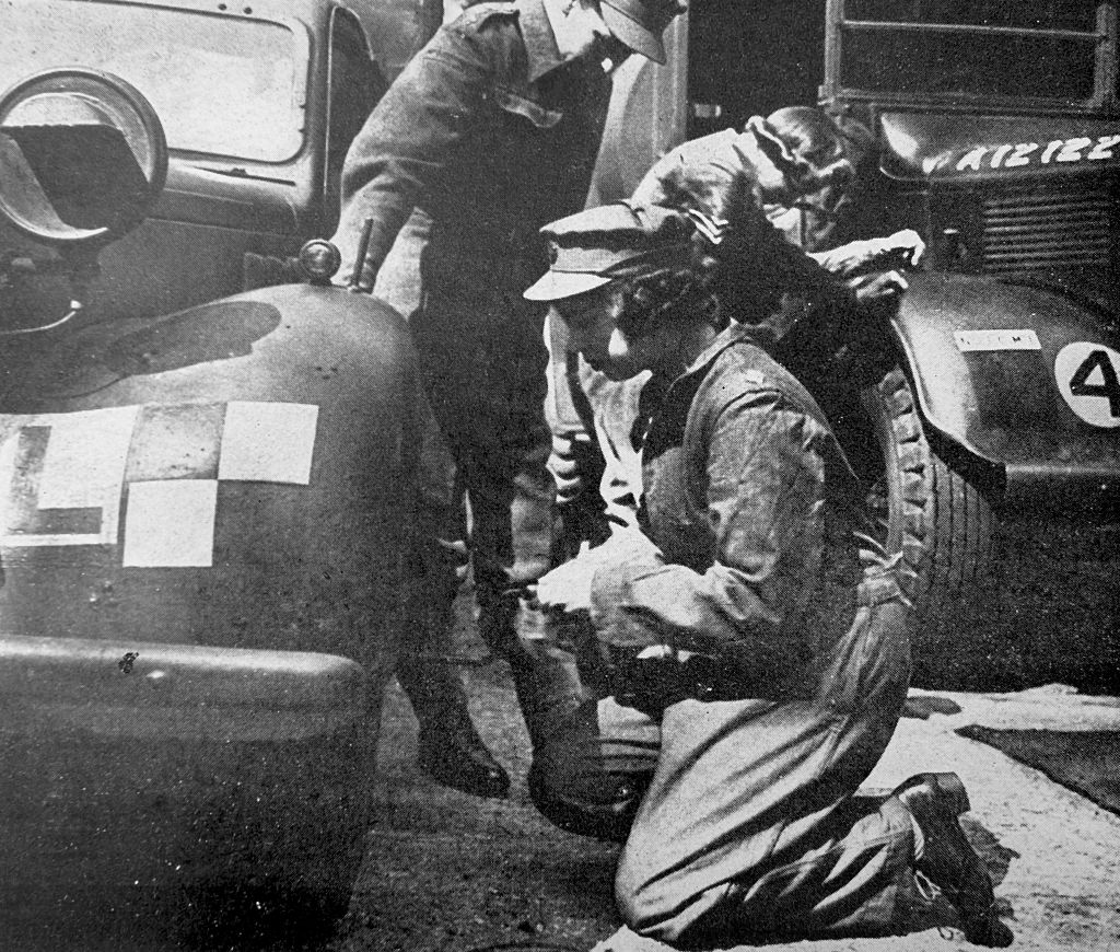 Princess (later Queen ) Elizabeth of Great Britain doing technical repair work during her World war two military service, 1944.