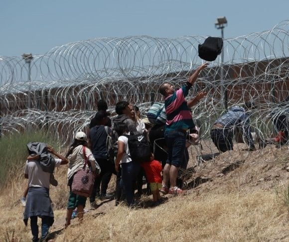 Wave of Humanity Hits U.S. Border