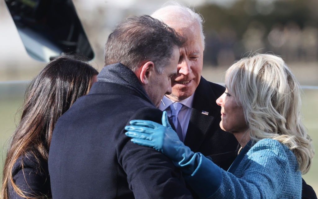 Joe Biden Sworn In As 46th President Of The United States At U.S. Capitol Inauguration CeremonyWASHINGTON, DC - JANUARY 20: U.S. President Joe Biden embraces his family after he was sworn in as the 46th President of the United States during his inauguration on the West Front of the U.S. Capitol on January 20, 2021 in Washington, DC. During today's inauguration ceremony Biden becomes the 46th president of the United States. (Photo by Jonathan Ernst-Pool/Getty Images)