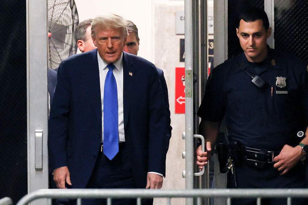 Opening Statements Begin In Former President Donald Trump's New York Hush Money TrialNEW YORK, NEW YORK - APRIL 22: Former U.S. President Donald Trump returns to court after a recess during opening statements in his trial for allegedly covering up hush money payments at Manhattan Criminal Court on April 22, 2024 in New York City. Former President Donald Trump faces 34 felony counts of falsifying business records in the first of his criminal cases to go to trial. (Photo by Yuki Iwamura-Pool/Getty Images)