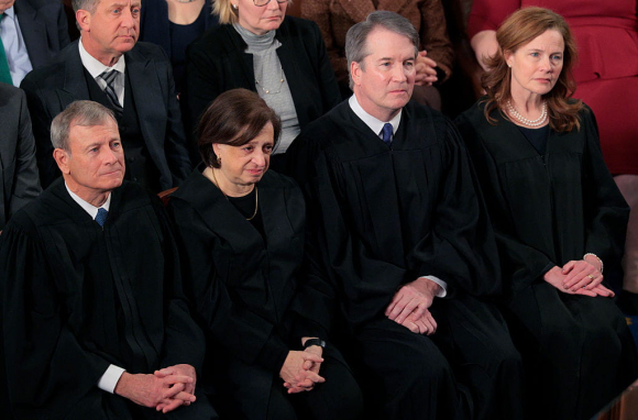 President Trump Delivers The State Of The Union Address WASHINGTON, DC - FEBRUARY 24: Supreme Court Chief Justice John Roberts, Associate Justice Elena Kagan, Associate Justice Brett Kavanaugh and Associate Justice Amy Coney Barrett attend the State of the Union address during a Joint Session of Congress at the U.S. Capitol on February 24, 2026, in Washington, DC. Trump delivered his address days after the Supreme Court struck down the administration's tariff strategy and amid a U.S. military buildup in the Persian Gulf threatening Iran. (Photo by Chip Somodevilla/Getty Images)