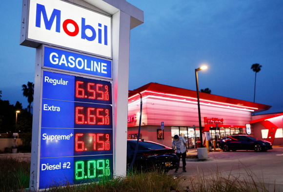 Price Of Gas Continues To Rise As War With Iran Drags On PASADENA, CALIFORNIA - MARCH 30: Gas prices are displayed at a Mobil gas station on March 30, 2026 in Pasadena, California. The average price of one gallon of regular self-service gasoline rose to $5.99 today in Los Angeles County, climbing from $4.69 one month ago, amid the ongoing war with Iran. (Photo by Mario Tama/Getty Images)